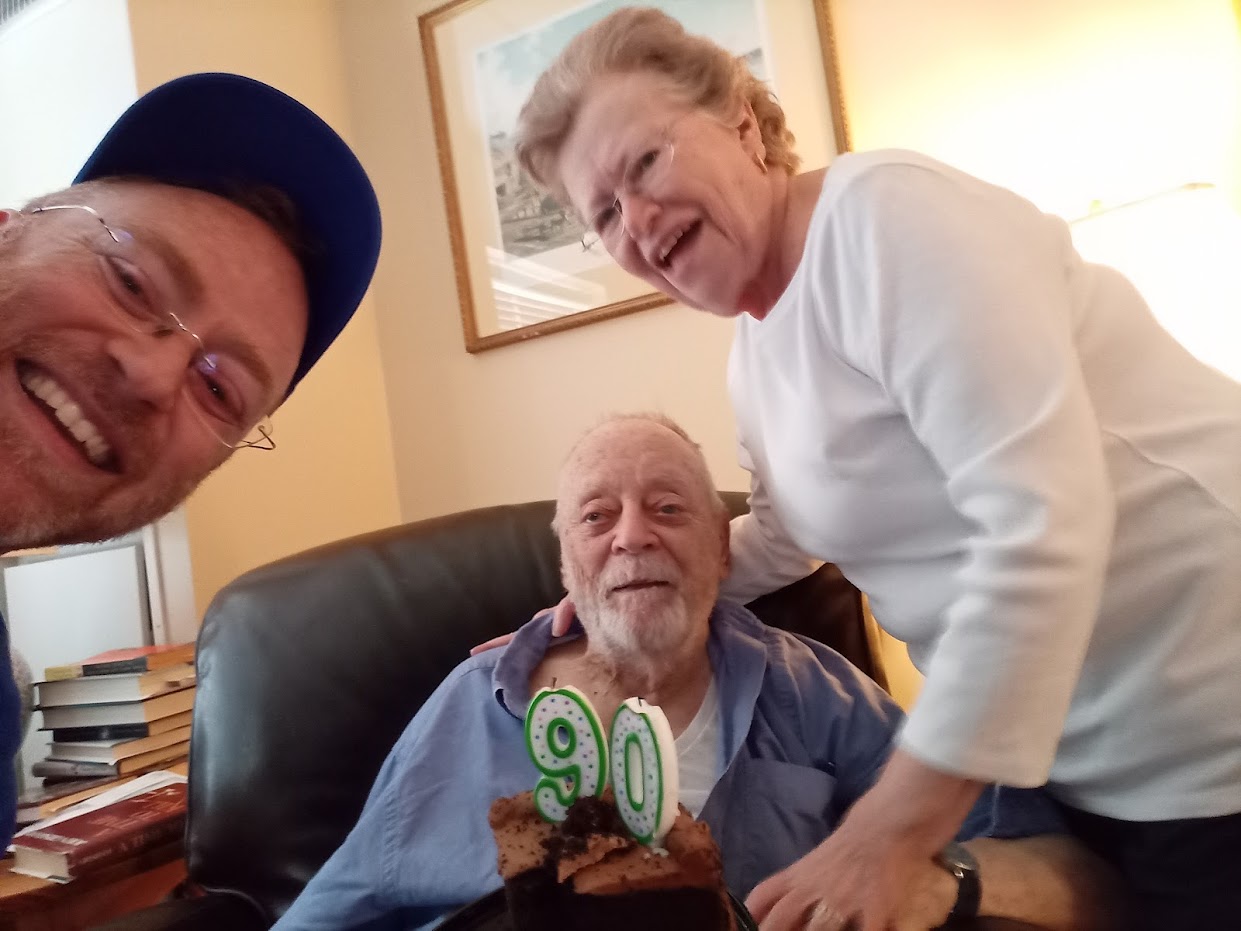 Brian with his parents celebrating his dad's 90th birthday